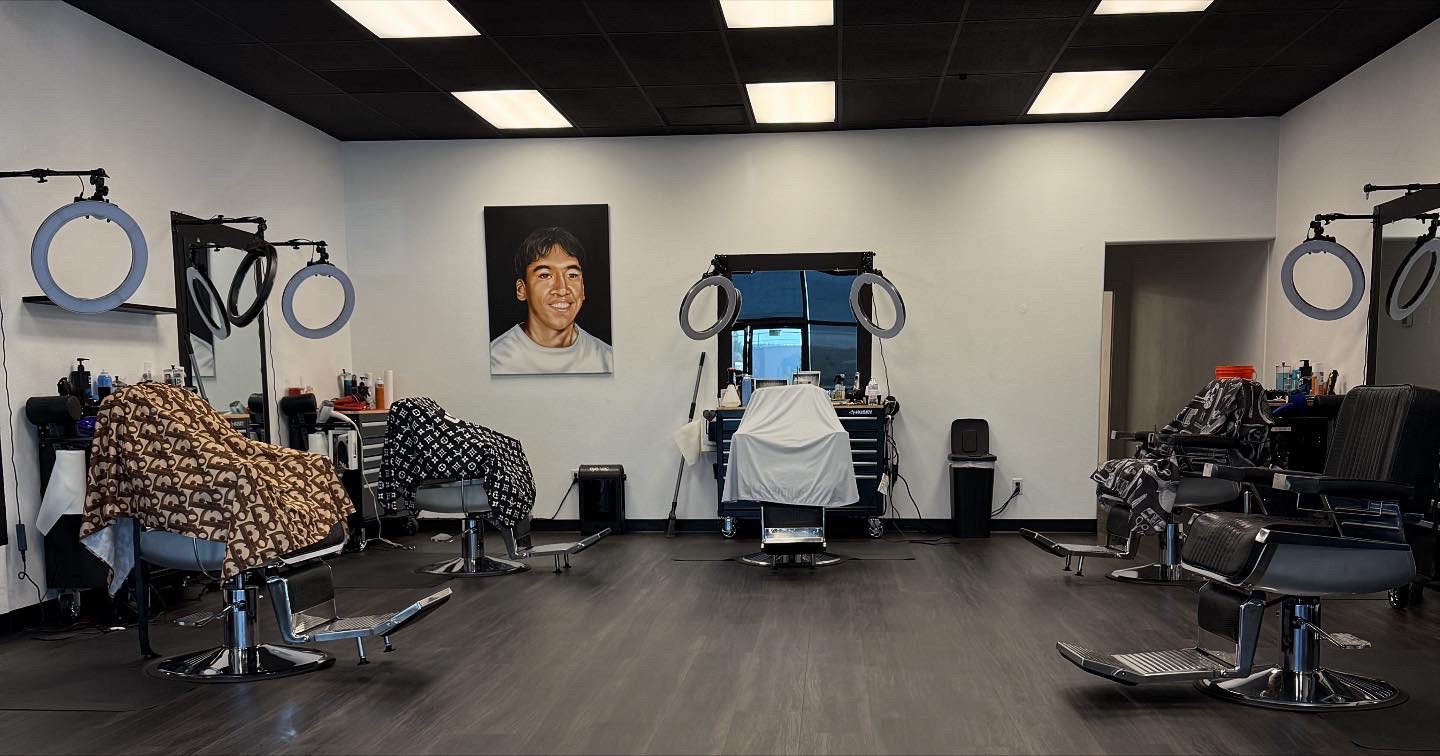 Barber stations at Faded Rey's with mirrors and ring lights